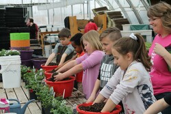 students planting at Rehoboth Christian Ministries