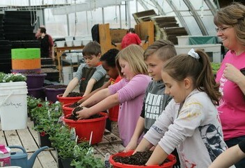 students planting at Rehoboth Christian Ministries